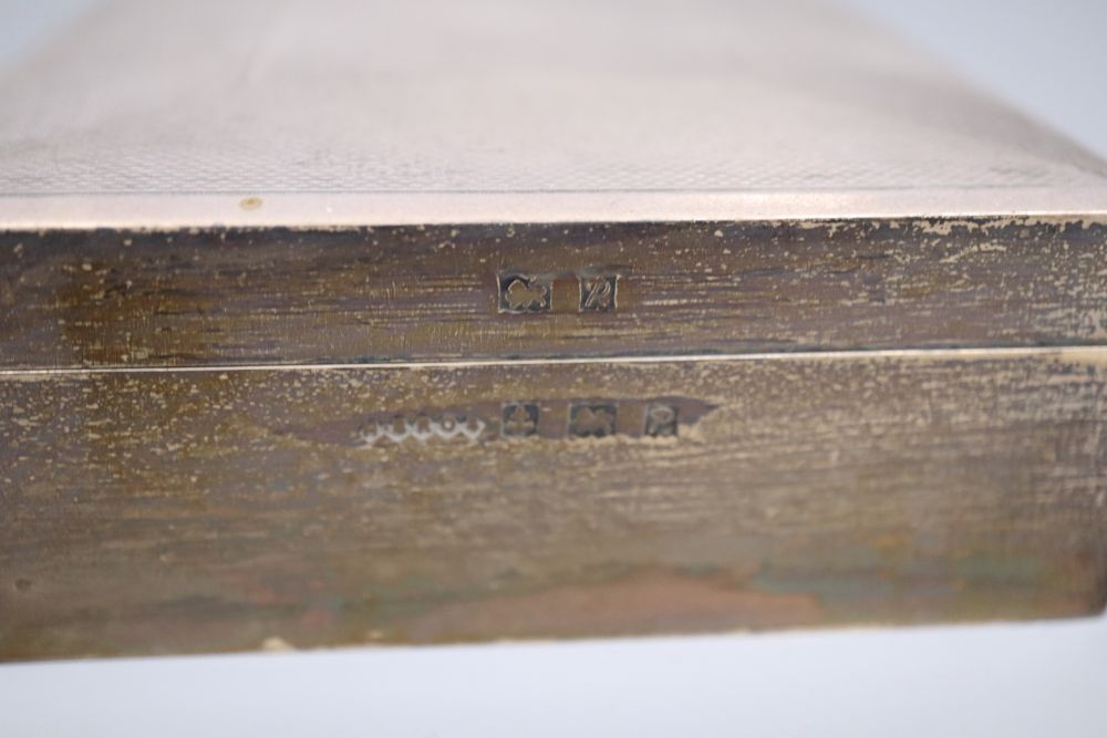 Two silver cigarette boxes, a silver cigarette case and Thai white metal cigarette box, largest 18.7cm.